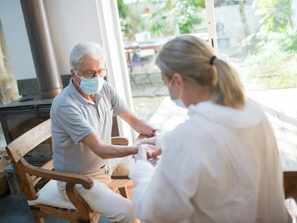 Elderly man undergoing a medical test, reflecting health support provided through home care services in San Francisco